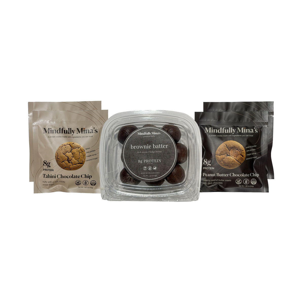 Three Mindfully Mina’s products side by side: a pouch of Tahini Chocolate Chip protein cookies on the left, a clear container of brownie batter protein balls in the center, and a pouch of Peanut Butter Chocolate Chip protein cookies on the right. Each package is labeled “8g protein.”