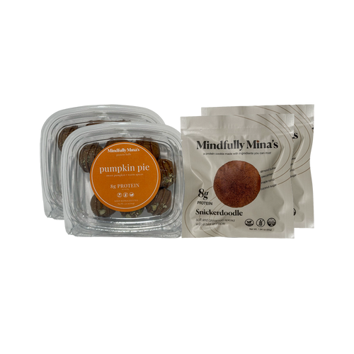 Two clear containers of Mindfully Mina’s pumpkin pie protein balls with orange labels reading “8g protein,” next to two beige pouches of Snickerdoodle protein cookies. Each pouch shows a round cinnamon-coated cookie and 8g protein.