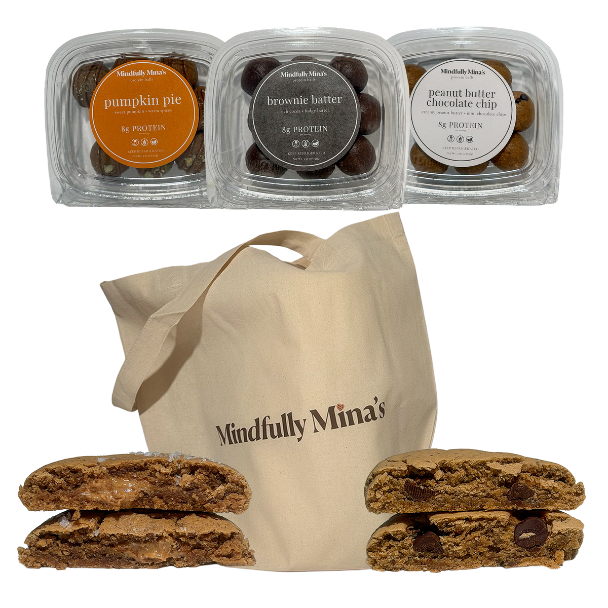 At top, three clear containers of Mindfully Mina’s protein balls: pumpkin pie with an orange label, brownie batter with a brown label, and peanut butter chocolate chip with a white label, each reading “8g protein.” Below, a natural canvas tote bag printed with “Mindfully Mina’s,” flanked by two halved cookies. On the left, a cookie with a melty peanut butter center and flaky salt. On the right, a tahini chocolate chip cookie with large chocolate pieces.