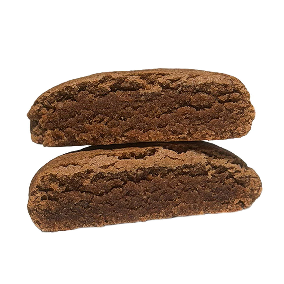 A Snickerdoodle protein cookie cut in half and stacked, showing a dense, soft, dark brown interior with a lighter, crackled crust.