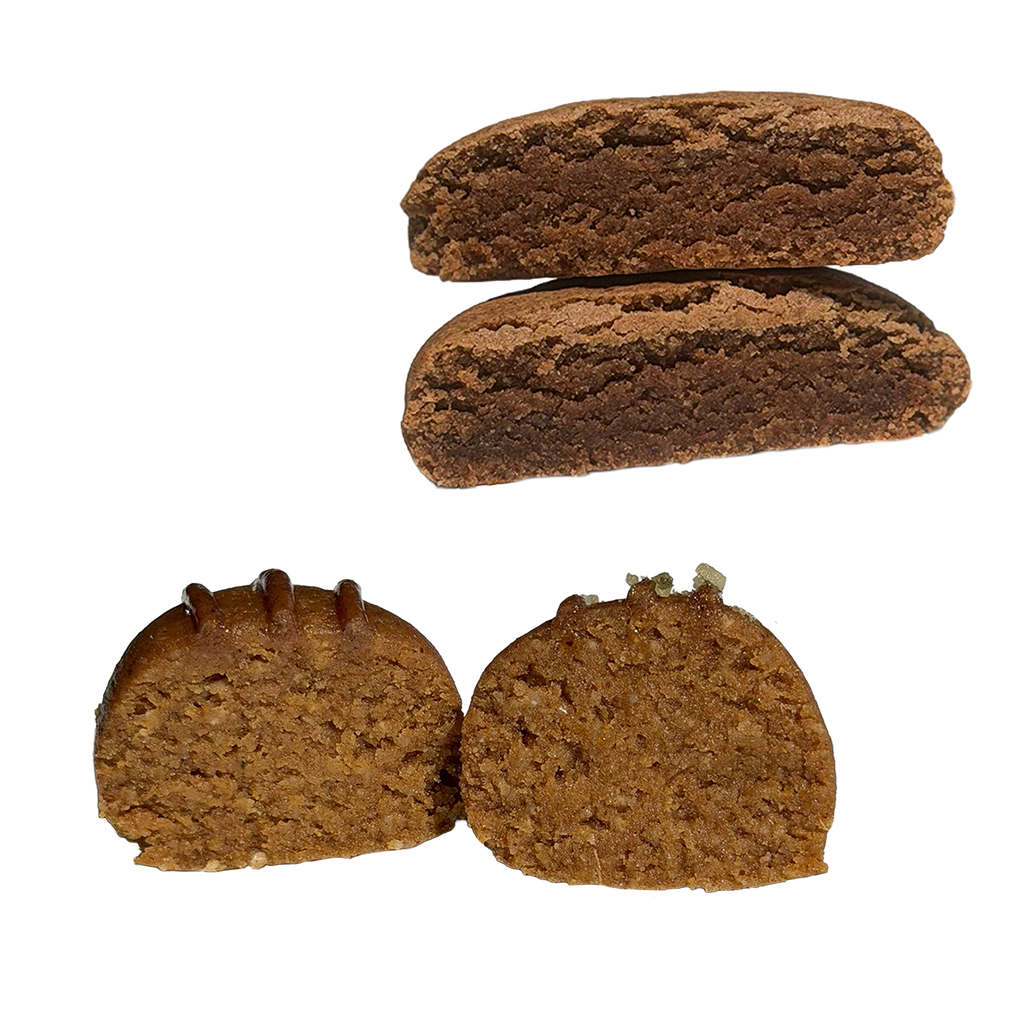 At top, a Snickerdoodle protein cookie cut in half and stacked, showing a soft, tender brown interior. At bottom, a pumpkin pie protein ball cut in half, topped with glaze on one half and crushed pumpkin seeds on the other.